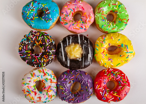 colorful doughnuts white background studio