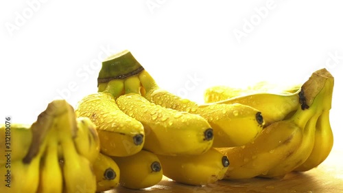 Bananas. A bunch of bananas rotates, an interesting foreshortening, an advertising shot.