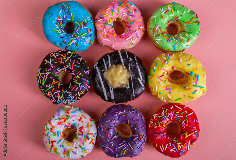 colorful doughnuts pink background studio colorful doughnuts pink background studio