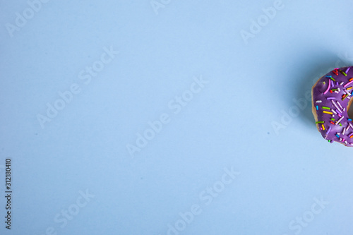 colorful doughnut blue background studio