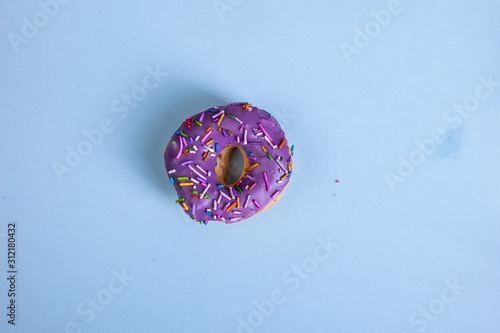 colorful doughnut blue background studio