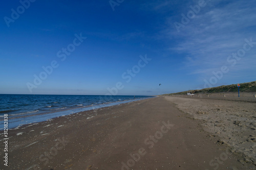 beach holland sand blue sky sunny day wind