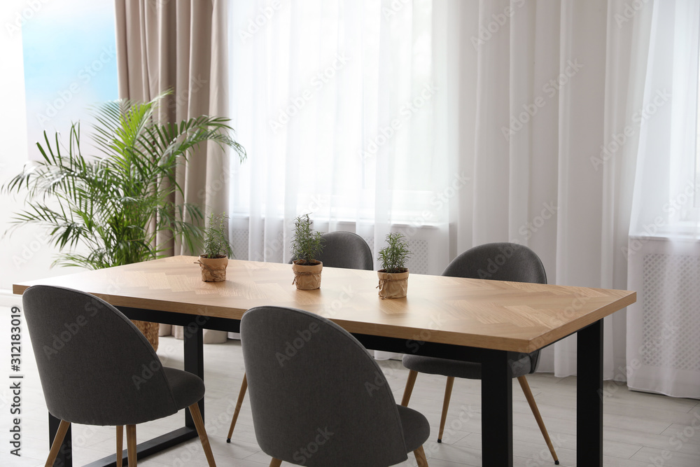 Modern room interior with chairs and table Modern room interior with chairs and table