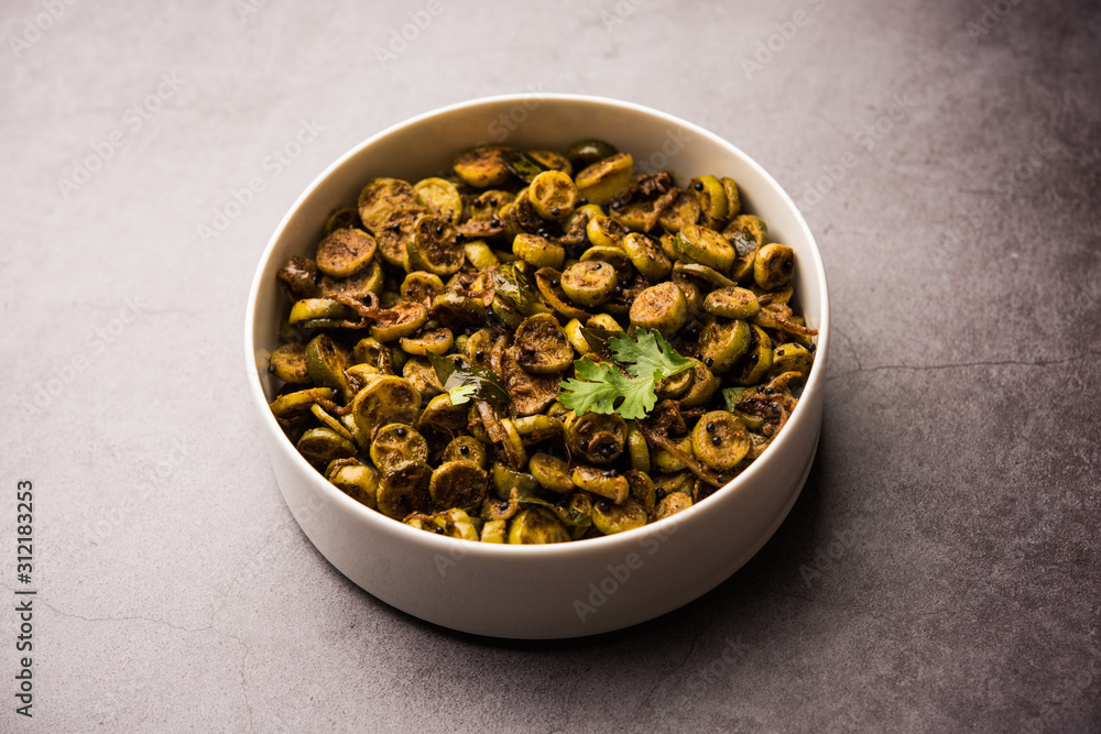 Tendli / Kundroo sabzi or Kovakkai Poriyal also known as ivy gourd, served in a bowl or karahi. selective focus