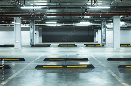 Horizontal image of empty underground parking lot