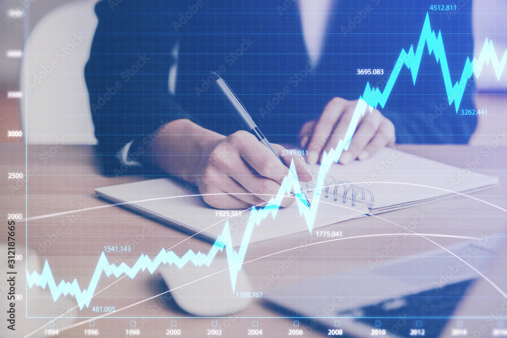 Forex graph on hand taking notes background. Concept of research. Multi exposure Forex graph on hand taking notes background. Concept of research. Multi exposure