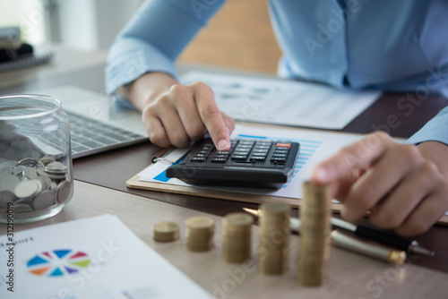 Business woman working in office with documents