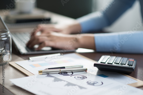 Business woman using laptop