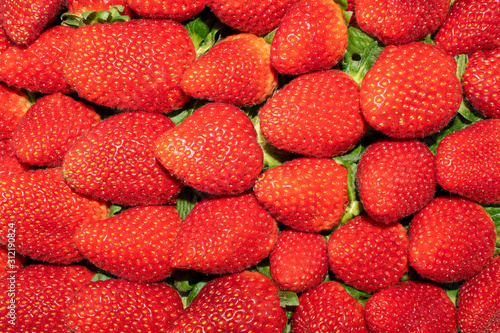 Fresh big red strawberries background. Healthy food, summer berries, slimming food. Top view. Strawberry background.