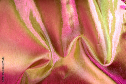 folds on taffeta fabric with color tints, background image