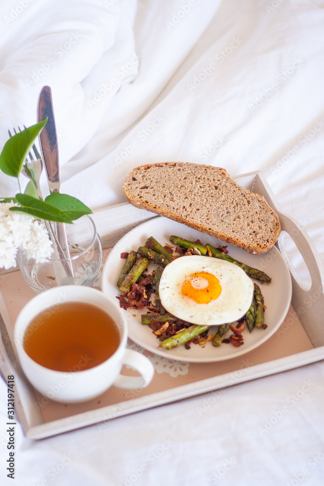 Breakfast in bed - roasted asparagus and sunny side egg Breakfast in bed - roasted asparagus and sunny side egg