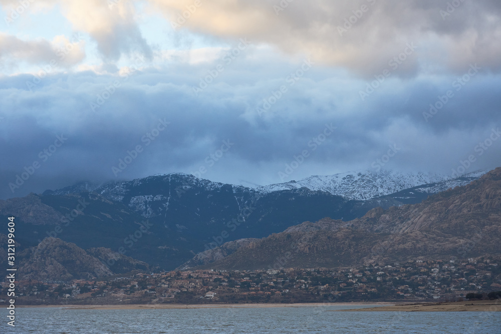 Manzanares El Real and La Pedriza from the Santillana reservoir. National Park of the Sierra de Guadarrama. Madrid's community. Spain