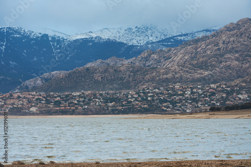 Manzanares El Real and La Pedriza from the Santillana reservoir. National Park of the Sierra de Guadarrama. Madrid's community. Spain