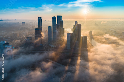 A aerial view of towers of the Moscow International Business Centre also known as Moscow City at dawn. photo