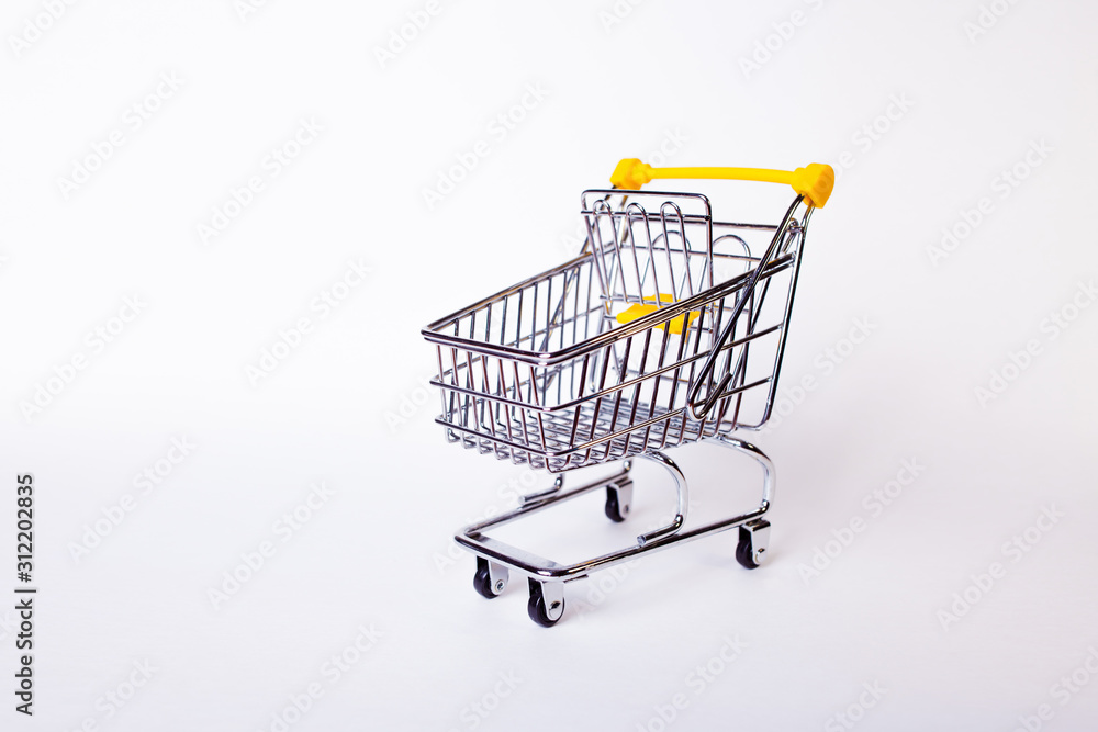 Shopping cart concept of shopping and sales, retail and shops. Shopping cart concept of shopping and sales, retail and shops.