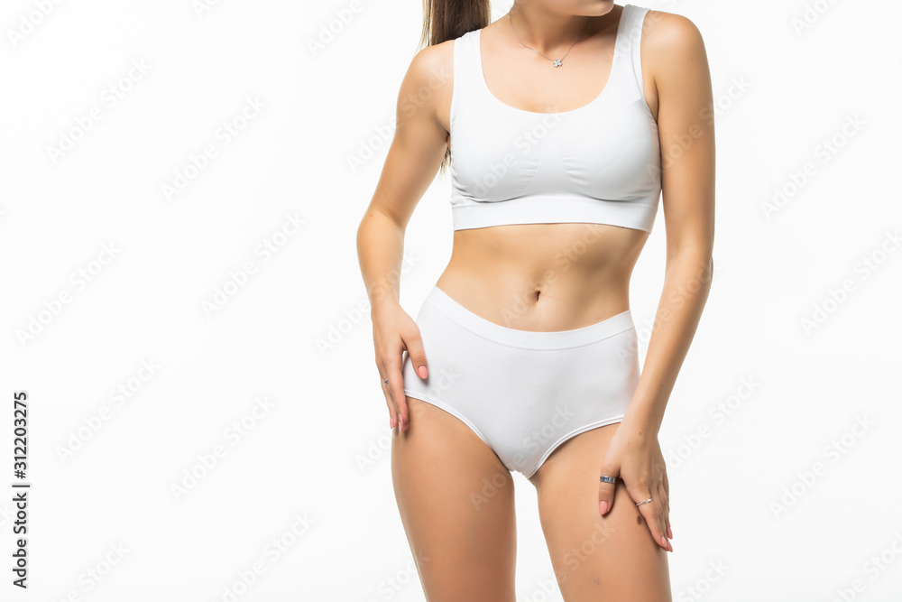 Partial side view of slim woman in underwear isolated on white background