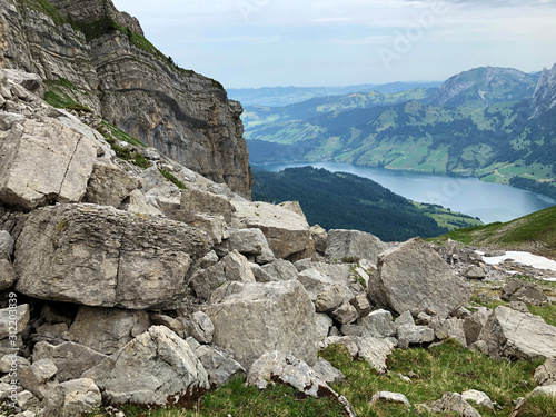 Stones and rocks of the alpine peaks above the Wagital or Waegital valley and mountain lake Wagitalersee (Waegitalersee), Innerthal - Canton of Schwyz, Switzerland photo