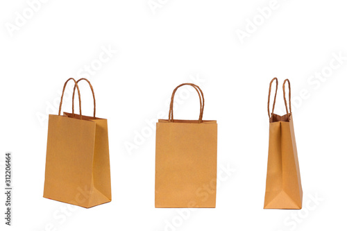 Brown paper shopping bags with handle isolated on white background.