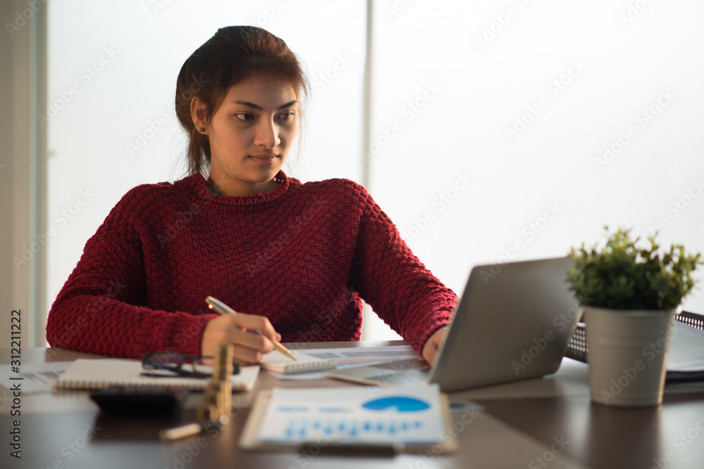 Business woman working in office with documents Business woman working in office with documents