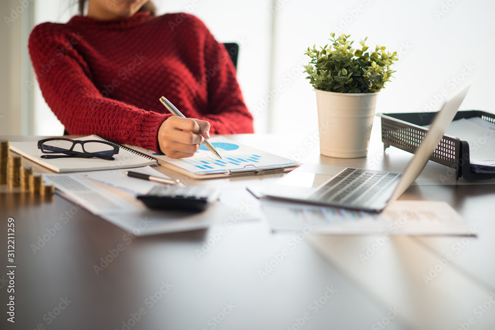 Business woman working in office with documents Business woman working in office with documents
