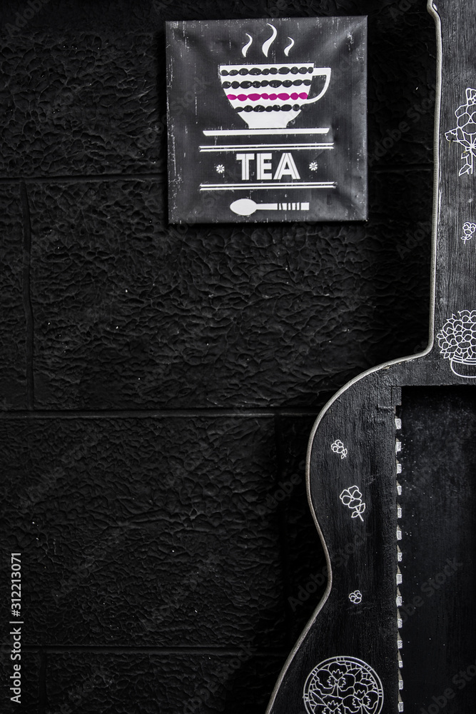 Fototapeta premium Guitar and Black Background