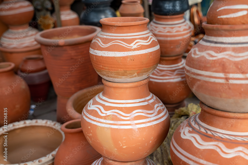 Decorative terracotta clay pots for sale at a street market in New Delhi India Decorative terracotta clay pots for sale at a street market in New Delhi India