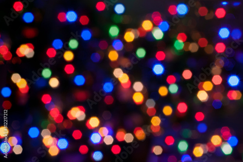 Beautiful bright abstract background - colorful bokeh. Texture for holiday, new year, christmas