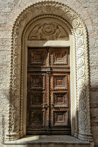 Carved wooden door in the town of Kotor in Montenegro