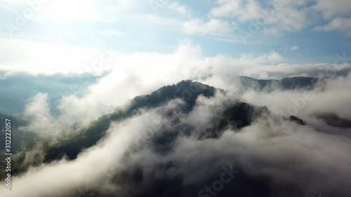 morning clouds in the mountains aerial, aerial view of morning fog in mountains, Aerial view above the clouds and sky in sunrise time, Majestic clouds in the mountains landscape in Carpathian