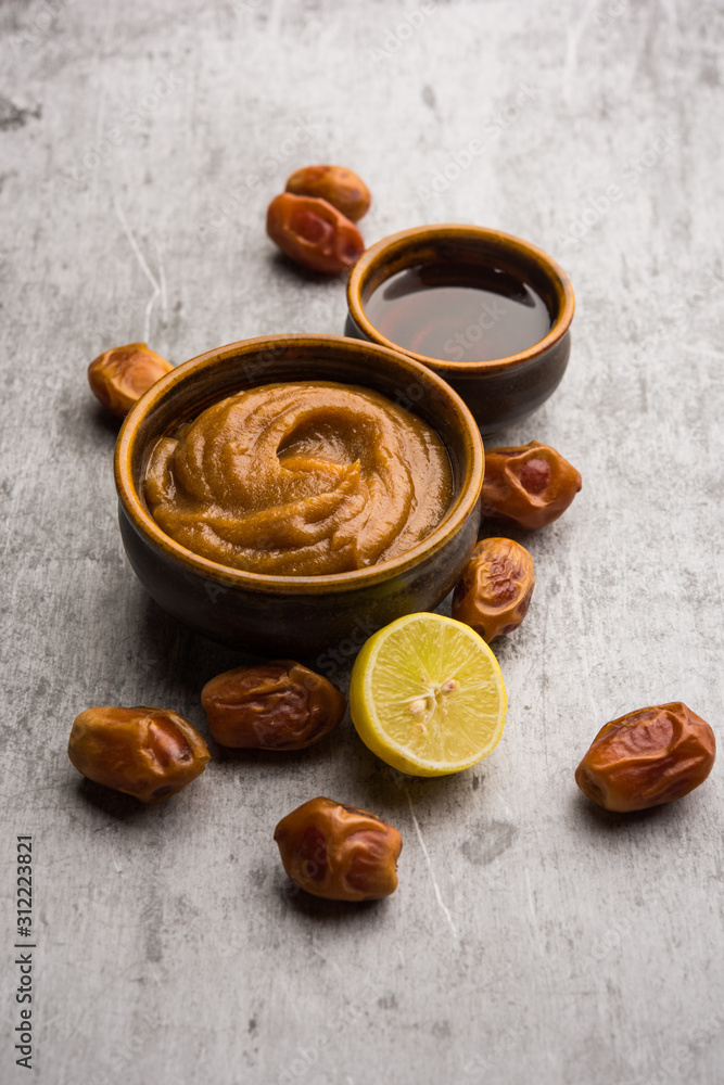 Dates Face mask for supple, smooth and clear skin with ingradients like fresh raw khajoor, lemon and honey. selective focus Dates Face mask for supple, smooth and clear skin with ingradients like fresh raw khajoor, lemon and honey. selective focus