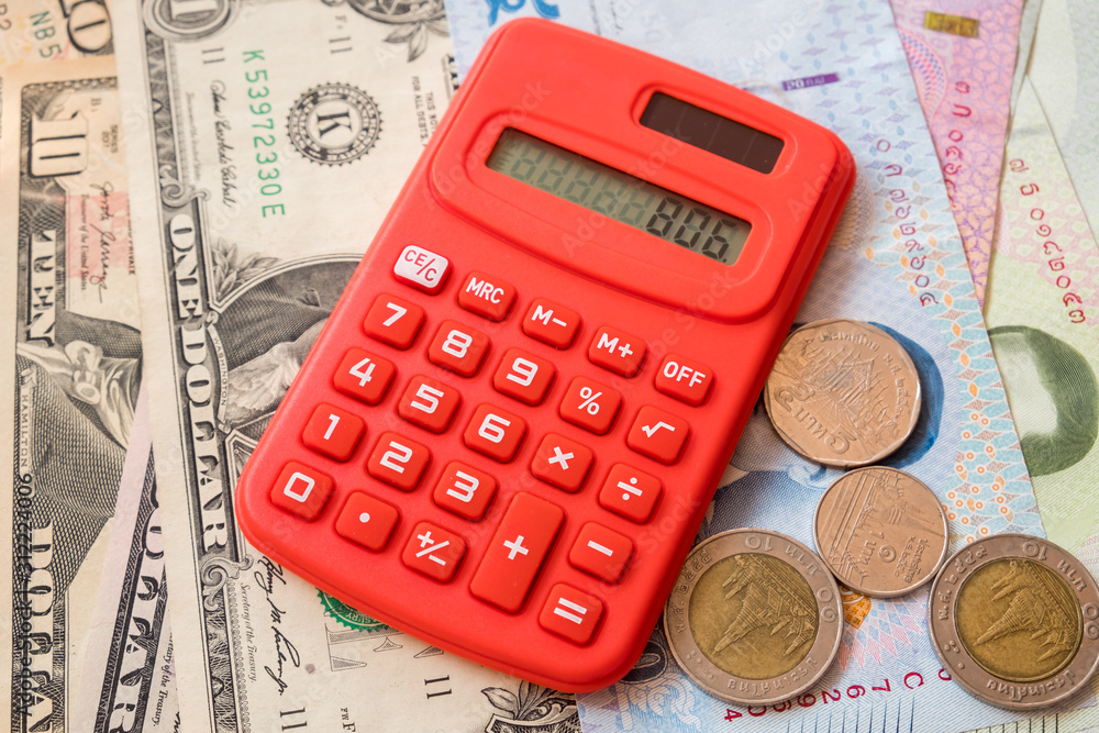 Thailand Baht, Chinese Yuan, US Dollar banknotes and Thailand Baht coin. calculation amount of money Thailand Baht, Chinese Yuan, US Dollar banknotes and Thailand Baht coin. calculation amount of money