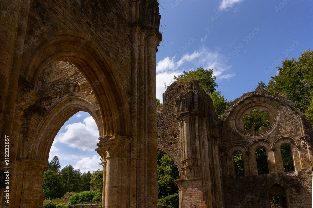 Orval Abbey, in Belgium. Ruins of the Cistercian monastery and the Gothic church. Travel by car in summer