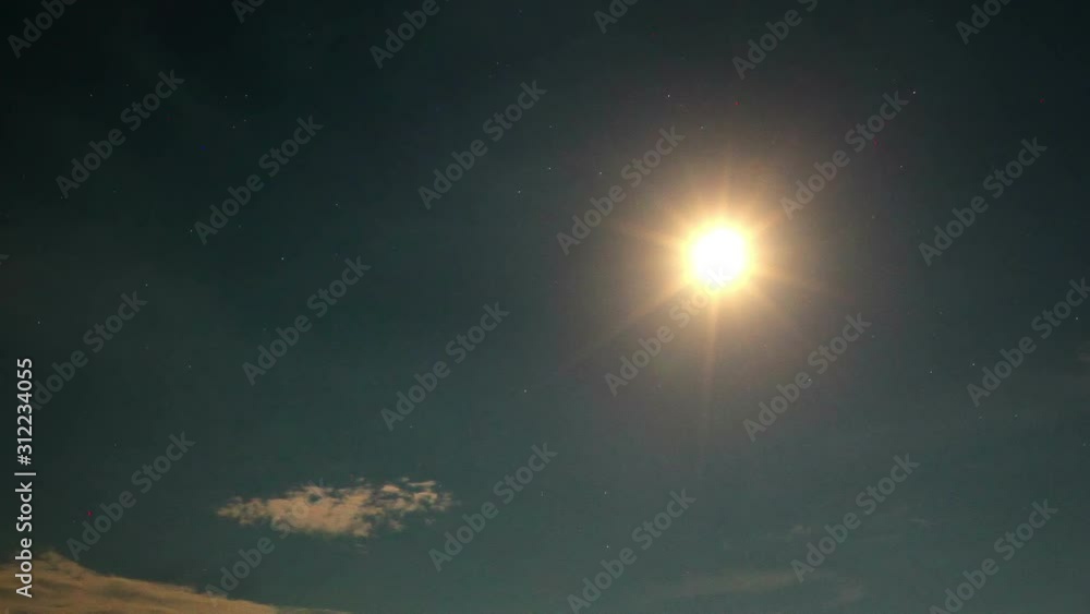 moon in the night sky. timelapse. moon in the night sky. timelapse.