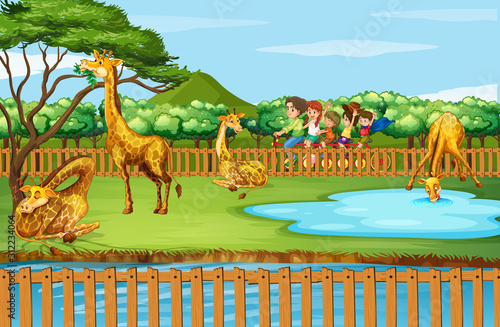 Scene with giraffes and people at the zoo
