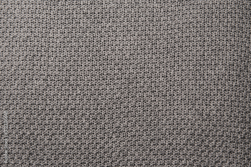 Knitted fabric wool texture close up as a background.