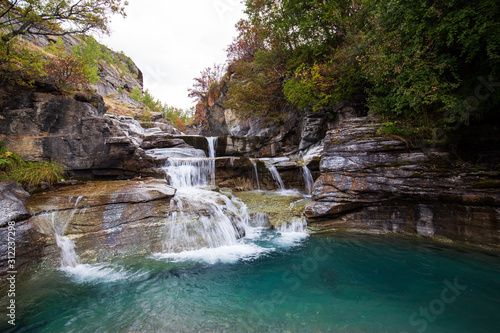 Fototapeta Naklejka Na Ścianę i Meble -  Waterfalls in the Alps mountains.