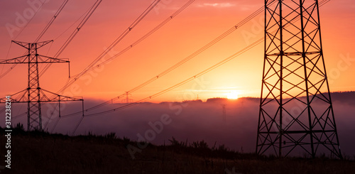 high voltage post,High voltage tower sky surise background