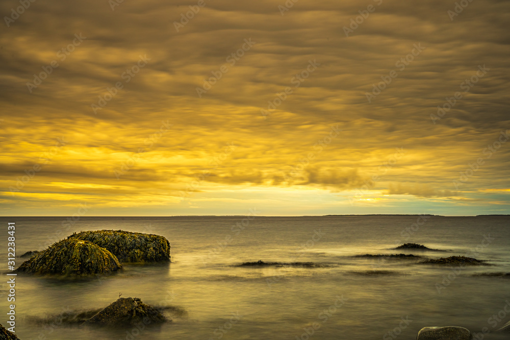 Long exposure seascape along Nova Scotia's rocky seacoast shoreline.