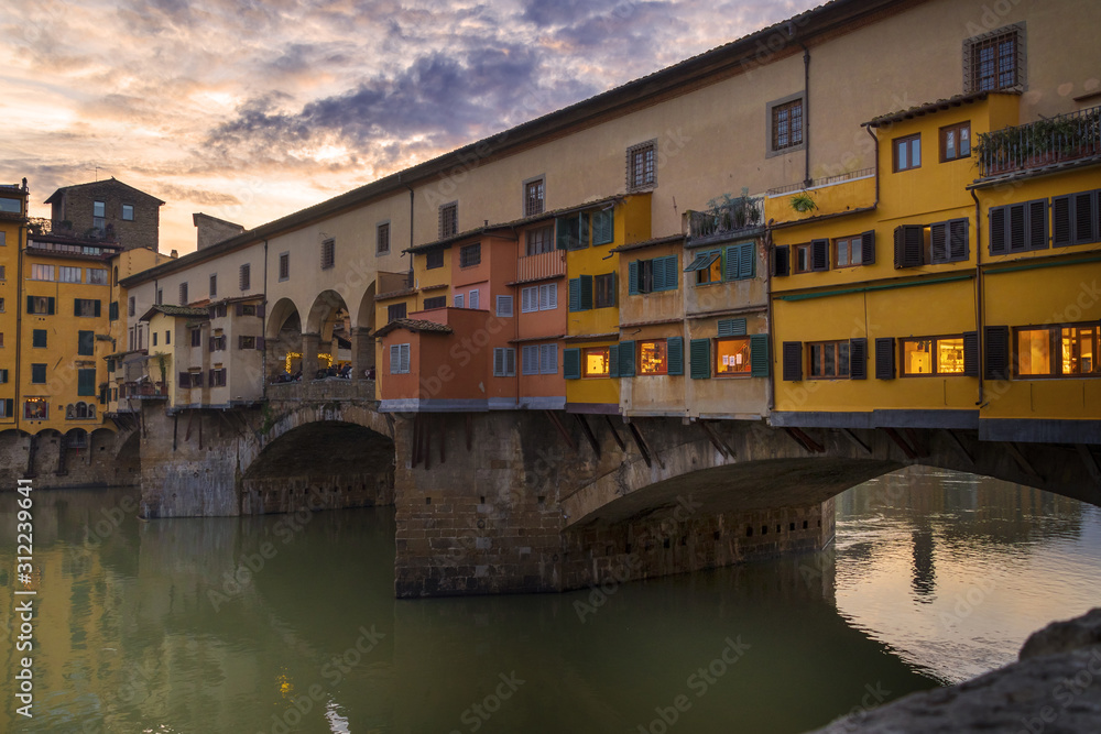 Old bridge in florence at sunset