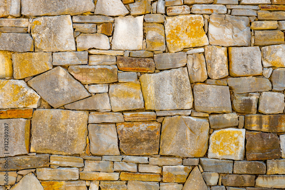 Old stone brick wall pattern texture background. Old wall of ancient ...