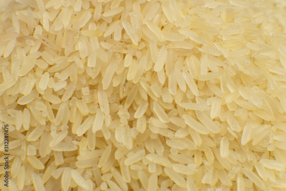 Long grain white rice background. Macro. Rice texture. Top view Long grain white rice background. Macro. Rice texture. Top view