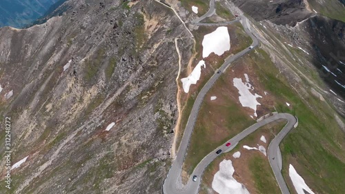Aerial top view point of Grossglockner Hochalpenstrasse - Scenic Alpine mountains Austria, sunny summer day, blue sky. Motorcyclists and car travelers road. vacation and adventure, (Edelweissspitze)