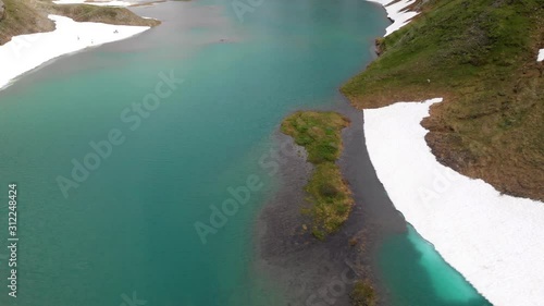 Aerial view point of Grossglockner Hochalpenstrasse Alpine Road in Austria, summer day. Motorcyclists and travelers road. (Nassfeldspeicher, Margaritzenstausee, Heiligenblut lake)