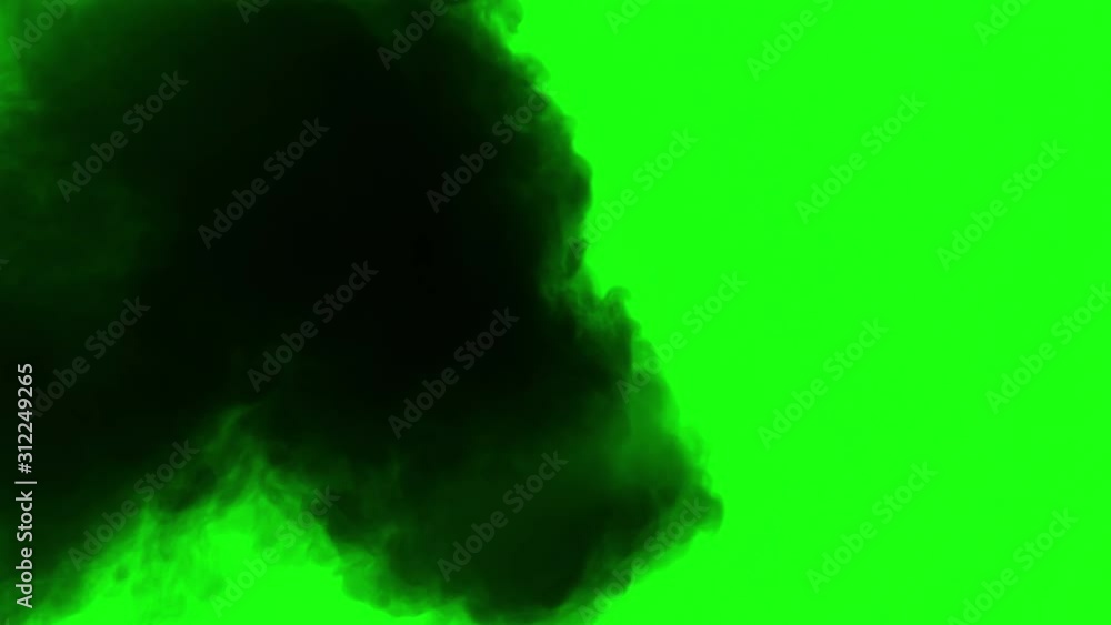Jet of Black Smoke Overlaps the Screen. Puffs of black smoke on a green chromakey slowly fill the screen Jet of Black Smoke Overlaps the Screen. Puffs of black smoke on a green chromakey slowly fill the screen