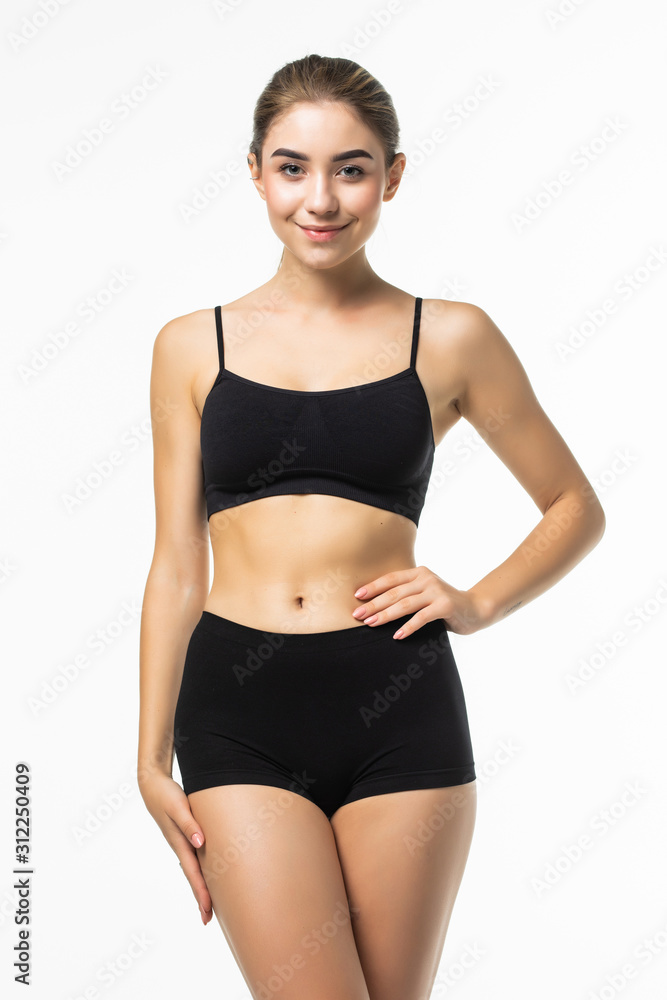 Fitness woman with a beautiful body in black lingerie isolated on white background Fitness woman with a beautiful body in black lingerie isolated on white background