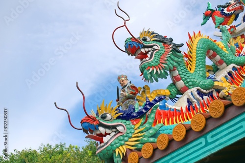 Wallpaper Mural Dragons, ornaments and other religious symbols on a Chinese shrine in Phuket, Thailand.  Torontodigital.ca