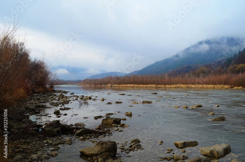 Fototapeta Naklejka Na Ścianę i Meble -  Mountain river water landscape. Wild river in mountains