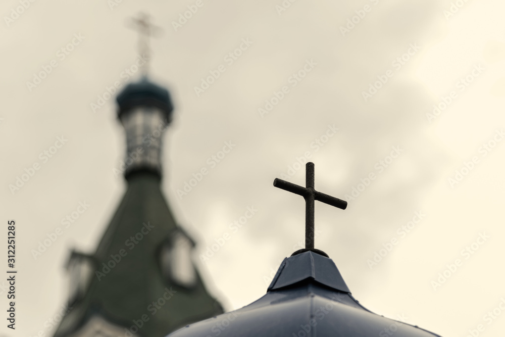 cross on the dome of the church. concept of religiosity and faith in god. toned cross on the dome of the church. concept of religiosity and faith in god. toned