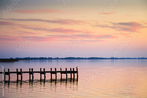 Tableau sur toile Jetty on the Pier of lake Neusiedl in Burgenland
