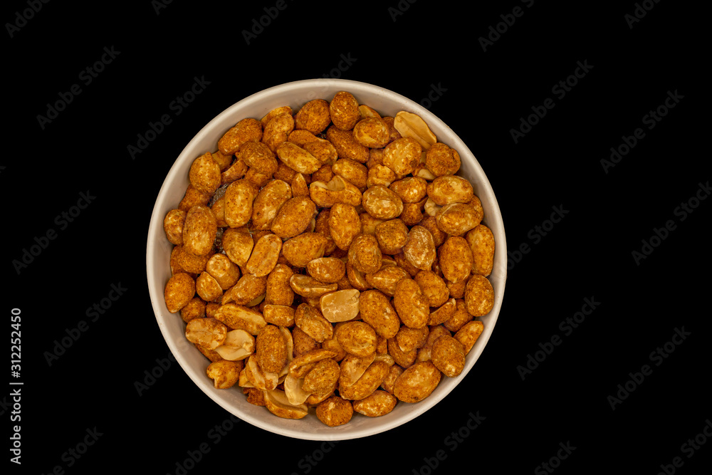 Small bowl full of dried roasted peanuts Small bowl full of dried roasted peanuts